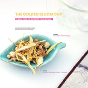 Golden Bloom Cup floral tea blend with chrysanthemum, jasmine and ginger in turquoise dish