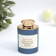 Peoni & Stone energy clearing incense blend with agarwood, mint and rosemary in navy jar with rose gold lid