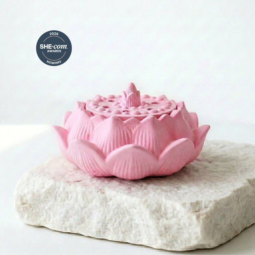 Pink lotus-shaped object on a white surface with a 'SHE.com Awards' badge above it. handmade in australia