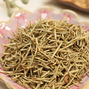 Orange tin canister with copper lid displaying Peoni & Stone Bloom energy clearing blend label