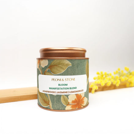 Pile of whole dried jasmine flowers with white and golden petals on ceramic plate