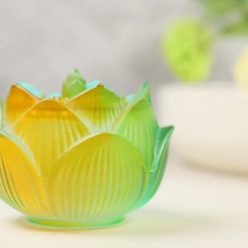 Bi-color glass lotus incense burner with yellow to blue-green gradient and ribbed petal design