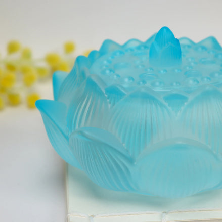 Translucent dawn blue frosted glass lotus flower incense burner with engraved petals and textured surface