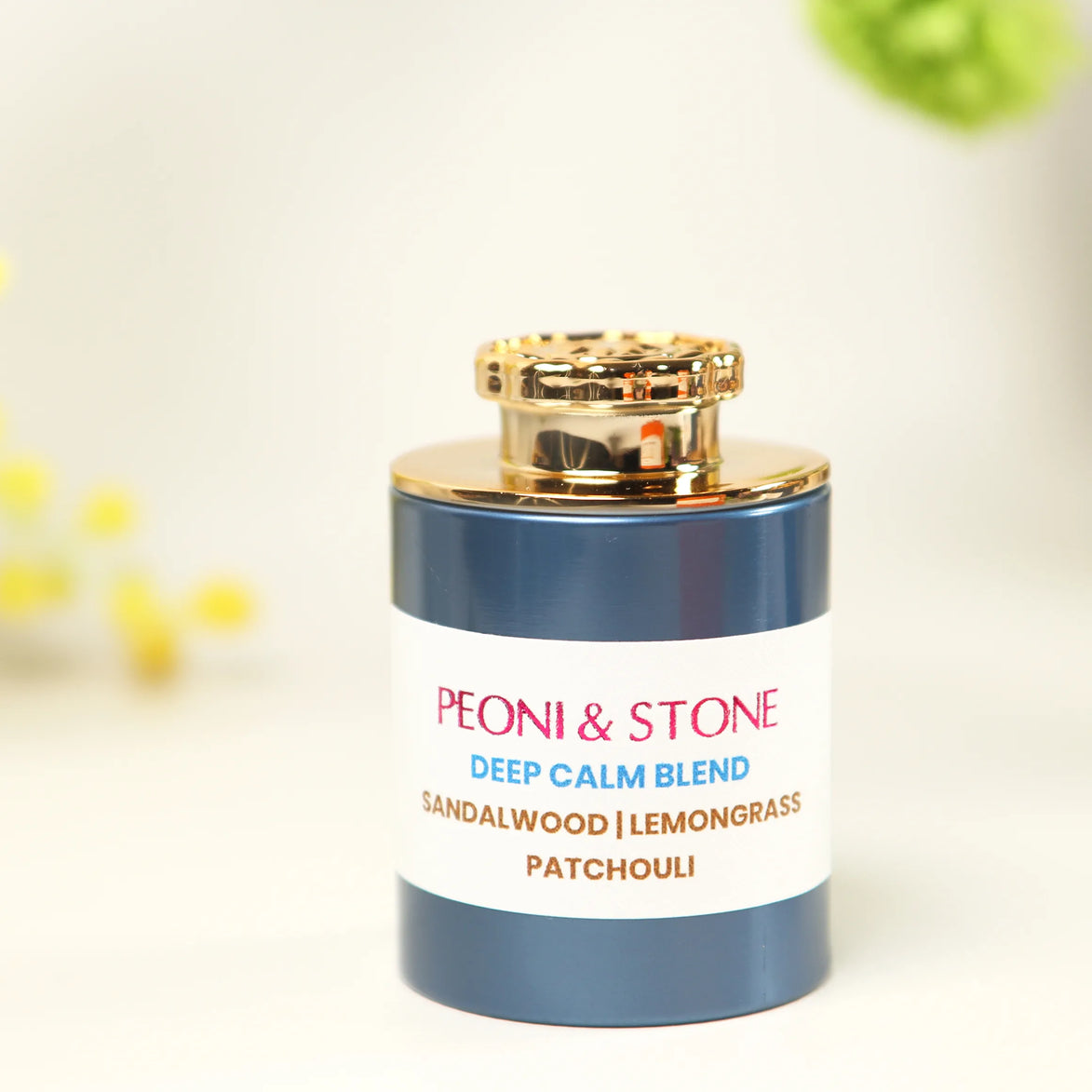 Peoni & Stone Deep Calm incense blend bottle with gold cap featuring sandalwood, lemongrass, and patchouli