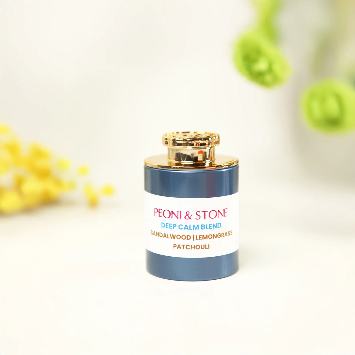 Three decorative bowls containing fine powdered incense blends in natural earth tones on wooden surface