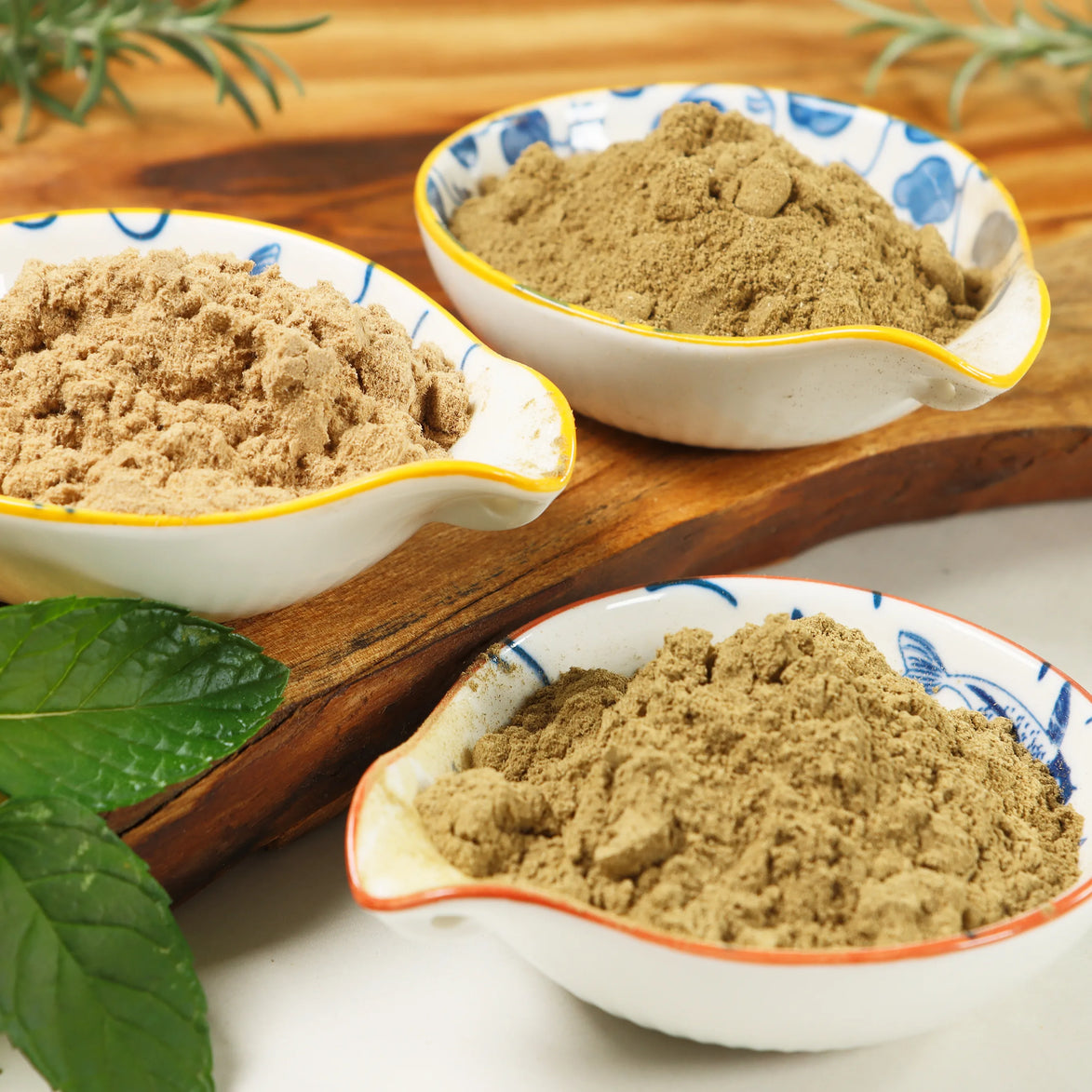 Navy and gold incense vessel with Peoni & Stone Energy Clearing label featuring agarwood, mint, and rosemary blend