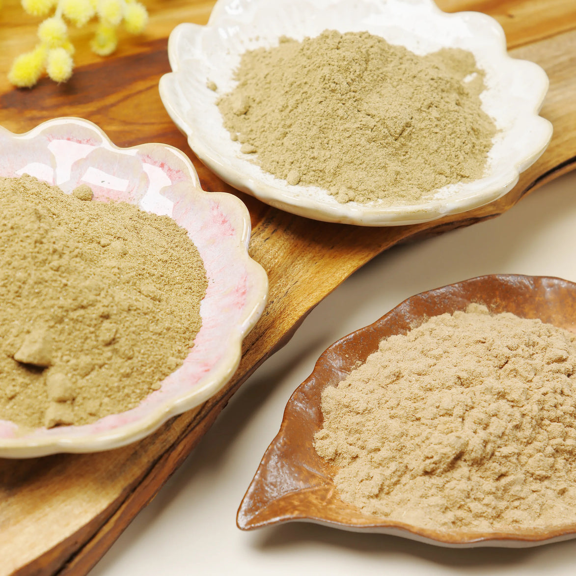 Navy blue incense bottle with gold decorative cap, labeled Peoni & Stone Energy Clearing with agarwood mint rosemary