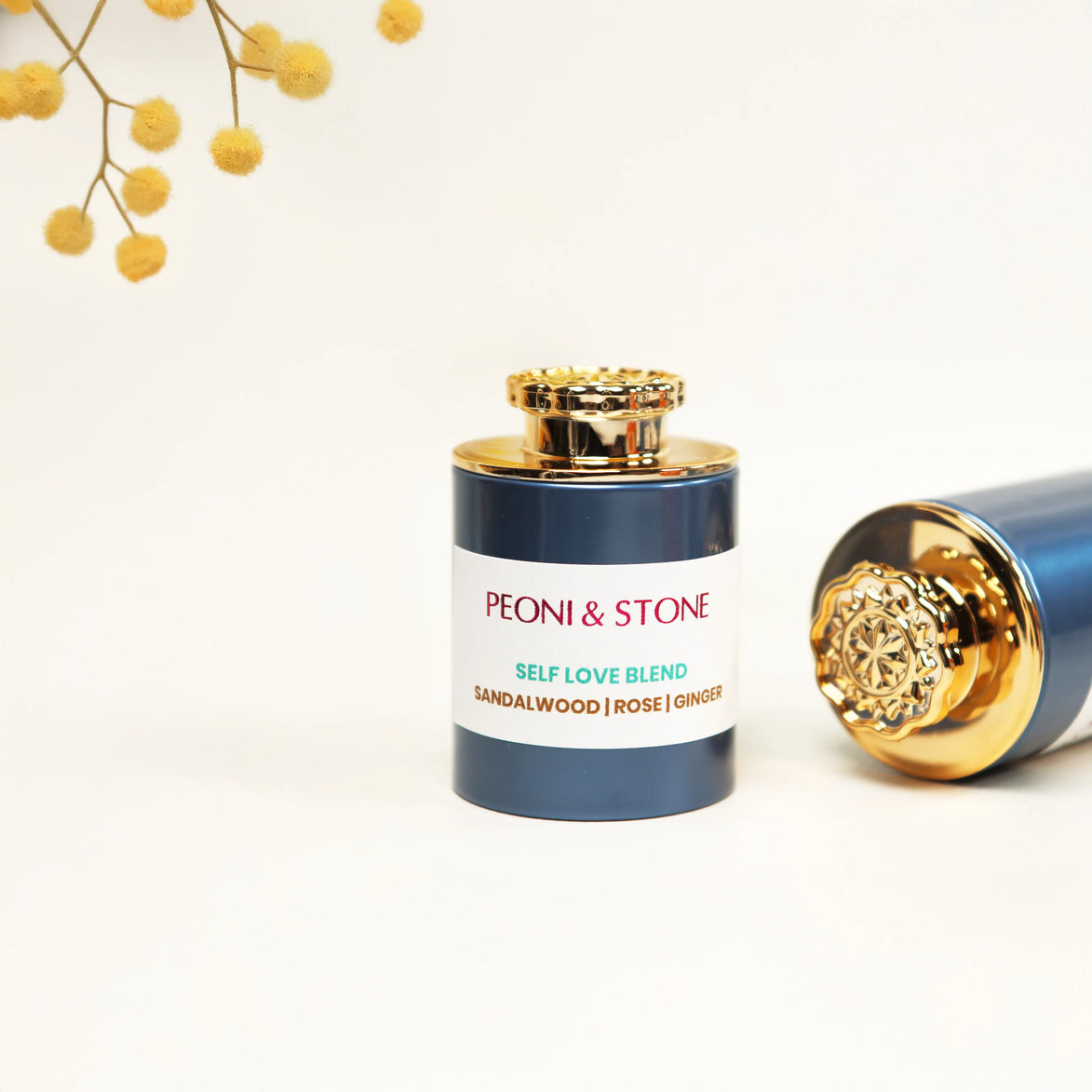 Navy and gold incense container with ornate decorative lid displaying Peoni & Stone Self Love Blend label