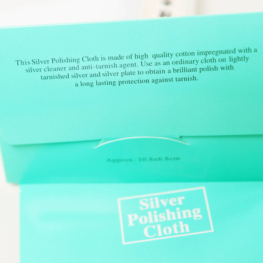 Mint green Peoni & Stone silver polishing cloth package with product information and white text labeling